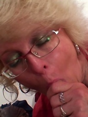 Sultry mature blonde in sexy glasses receives a big cock in her wet box and loves it
